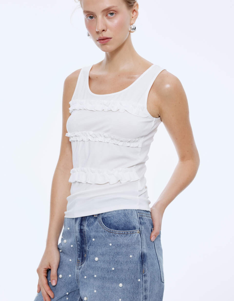 Топ с рюшами в рубчик