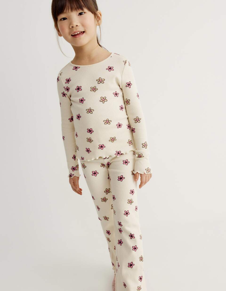 Трикотажные брюки клеш с принтом для девочек