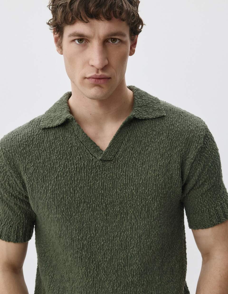 Вязаное поло с коротким рукавом