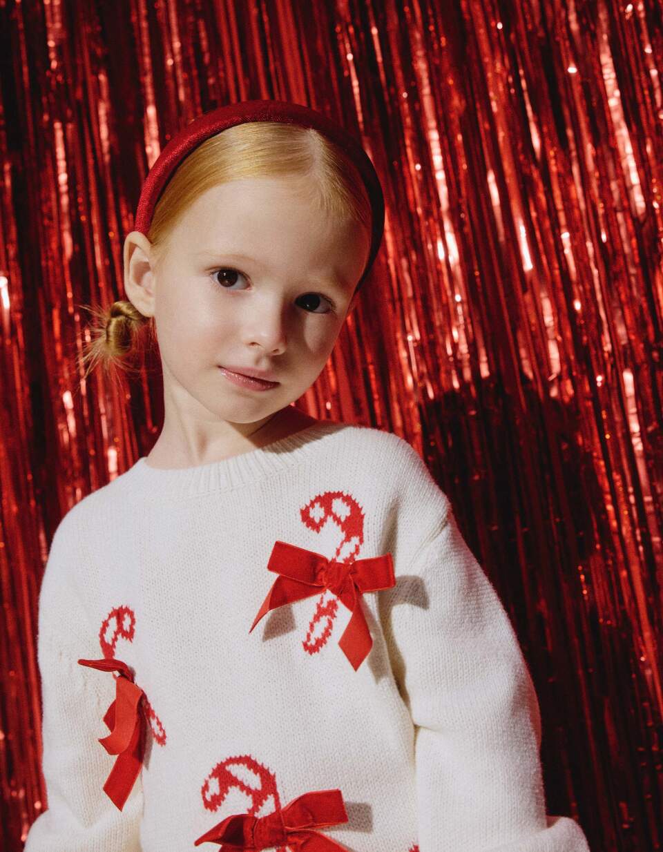 Вязаный джемпер с бантиками для девочек