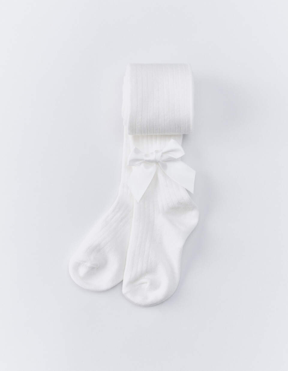 Трикотажные колготки с бантиками для девочек