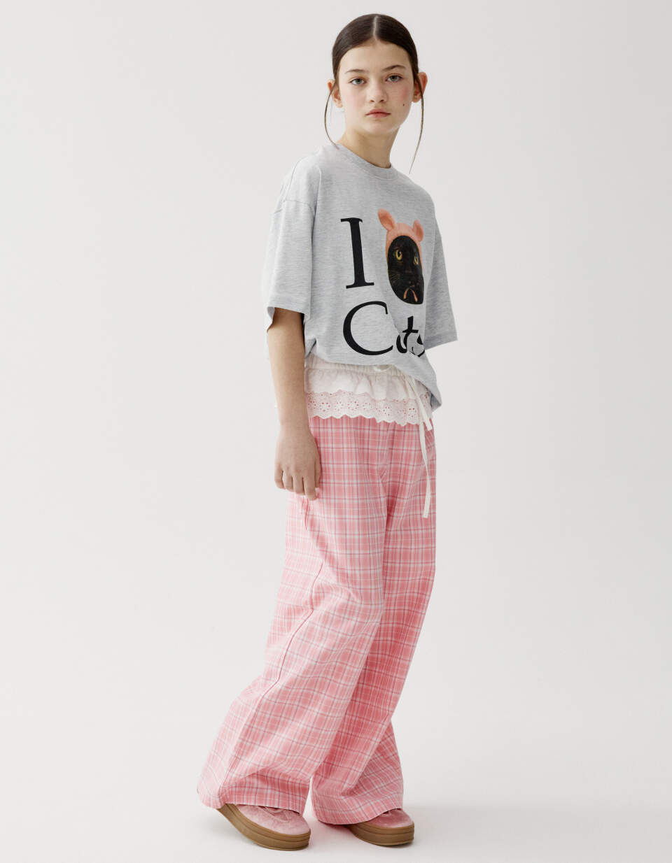 Широкие брюки в клетку с баской для девочек