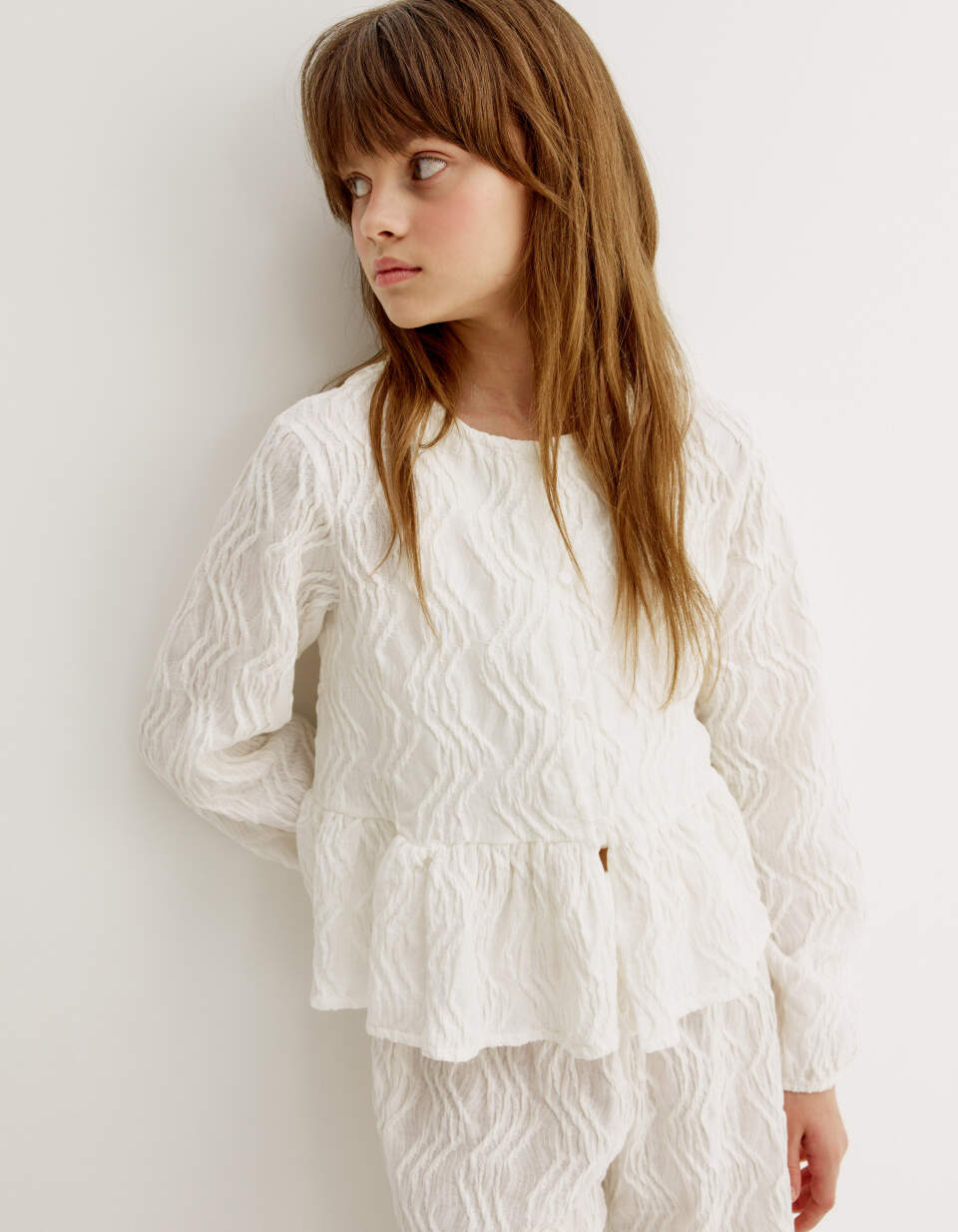 Трикотажная блузка с баской для девочек